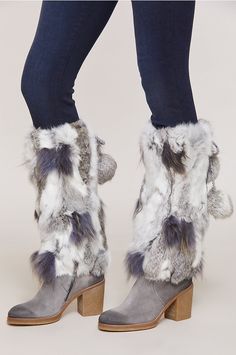 Fashion up your city boots with warmth and dazzle. Our cool Spanish rabbit fur toppers slide right over your boots to insulate from wind and cold, with smooth polyester lining offering an easy glide. They stay put with elastic closures, while the high end ties with twisted tassels finished with raccoon fur poms. Genuine Rabbit Fur. Winter Boots With Plush Lining For Cold Weather, Winter Faux Fur Boots With Plush Lining, Winter Boots With Plush Lining And Faux Fur, Winter Faux Fur Boots For Cold Weather, Casual Faux Fur Boots For Cold Weather, Montana Cowgirl, Winter Fur Boots, Fur Boot Covers, City Boots