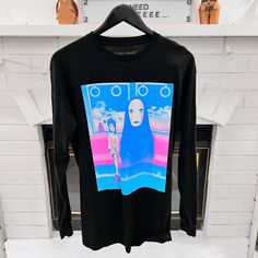 a long sleeved shirt with an image of a woman on the front and back