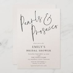 a wedding shower card with the words paris and prosces written in cursive ink