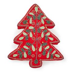 a red christmas tree ornament on a white background