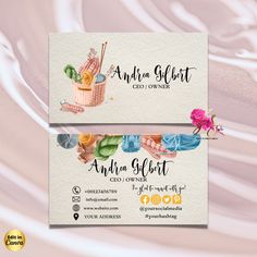 two business cards for an artisan artist with watercolor paint and flowers on them