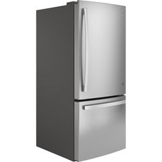 a silver refrigerator freezer sitting next to a white wall