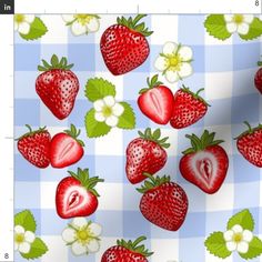 strawberries and flowers on a checkered tablecloth