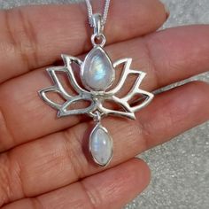 Product Description 925 Sterling Silver Lotus Flower Pendant set with Cabochon Moonstones Matching earrings also available - https://www.etsy.com/uk/listing/696435957/rainbow-moonstone-lotus-flower-925 Moonstone is the June Birthstone We recommend our 1.2mm Snake chains for this pendant, which you can select at checkout in various lengths, or just have the pendant on its own.  (Prices with a chain includes the pendant and chain price) If you prefer a different style of chain, we have other chain Lotus Flower Pendant, June Birthday, Muddy Waters, Wedding Bridal Jewellery, Sterling Silver Jewellery, June Birthstone, The Lotus, June Birth Stone, Bridal Jewellery