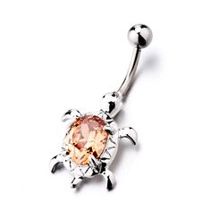 a sea turtle belly ring with an orange stone