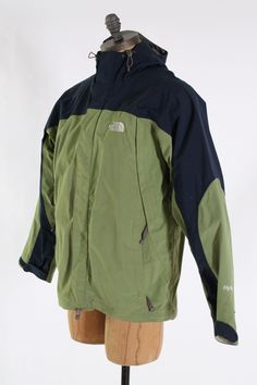 "Vintage RARE 1990s The North Face Goretex Mountain Jacket Olive Green and blue Size Medium 44\" chest 30\" length 25\" sleeve Good preowned condition. Please ask questions before purchasing, all sales are final." Winter Gore-tex Long Sleeve Outerwear, Gore-tex Long Sleeve Windbreaker For Fall, Fall Gore-tex Long Sleeve Windbreaker, Olive Green And Blue, Mens Brown Leather Boots, Military Motorcycle, Vintage Tuxedo, Mountain Jacket, Mens Leather Boots