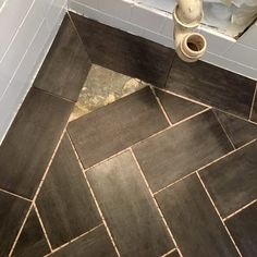 the bathroom floor is being remodeled with new tile