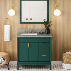 a bathroom with wood paneling and green cabinetry, white sink and gold faucet