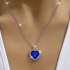 This Beautiful Necklace Features A Heart-Shaped Pendant With A Dark Blue Zircon Stone And A Sparkling Cubic Zirconia Accent. The Necklace Has A Lobster Closure And Measures Approximately 18 Inches In Length, With A 2-Inch Extender. The Blue Color Of The Pendant And Chain Adds A Touch Of Elegance To Any Outfit, Making It Suitable For Any Occasion. This Necklace Is A Lovely Gift For Someone Special Or A Treat For Yourself. The Necklace Is Made In China And Has A Chain And Pendant Style. Its Theme Blue Jewelry For Valentine's Day Party, Blue Heart Pendant Jewelry For Party, Blue Heart Necklaces For Party, Blue Heart Cut Jewelry For Party, Blue Heart Cut Necklace For Valentine's Day, Blue Jewlery, Black Metal Necklace, Clothes Fancy, Prom Planning