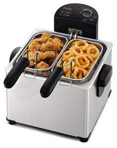 an electric deep fryer with two trays of food in front of it on a white background