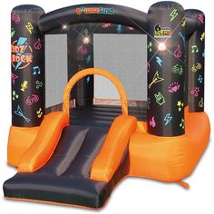 an inflatable bouncer with music notes on it and a blow up slide