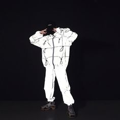 Our Reflective Techwear Jacket is low-key until you don't want it to be. The Techwear Jacket is in a smooth grey, but when it reflects any kind of light, it comes to life in a bright color mix between silver and white. It looks like it is from another dimension. Perfect for your next Festival, Rave, or Night Out Fitted White Reflective Long Sleeve Windbreaker, White Long Sleeve Windbreaker With Reflective Details, White Reflective Winter Outerwear, Winter White Outerwear With Reflective Details, White Sporty Windbreaker With Reflective Details, White Windbreaker With Reflective Details For Streetwear, White Streetwear Windbreaker With Reflective Details, Reflective Long Sleeve Winter Windbreaker, Winter Reflective Long Sleeve Windbreaker