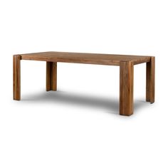 a wooden table sitting on top of a white floor