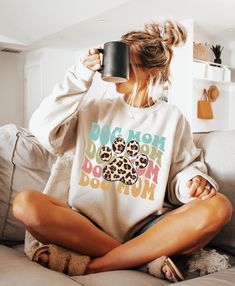 Dog Mom Sweatshirt, Leopard Dog Mommy Shirt, Dog Lovers T-Shirt For Mother, Dog Owner Shirt, Mother's Day Gift, Gifts For Pet Owners, S253 🛍️👚🎉 WELCOME TO CUSTOM STYLE TEE! ️ Looking for high-quality, comfy shirts you can customize for special occasions or loved ones? You're in the right place! At Custom Style Tee, we're passionate about our craft and dedicated to providing a great shopping experience. Got any questions about our products? Don't hesitate to reach out--we'll get back to you quickly! 🛒 H O W T O O R D E R 1️⃣ Take a moment to review all product photos. 2️⃣ Choose your T-shirt size and color. Note that different styles may have slightly different shades of the same color due to brand variations. For exact color matching, we suggest selecting shirts from the same style (e. Cute Dog Sweatshirts, Dog Mom Sweater, Dog Mommy, Mommy Shirt, Dog Mom Sweatshirt, Leopard Dog, Mommy Shirts, Dog Sweatshirt, Comfy Shirts