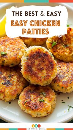 the best and easy easy chicken patties on a white plate with lemon wedges