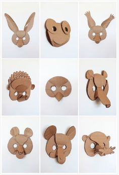 wooden masks made to look like animals with different shapes and sizes, all showing their faces