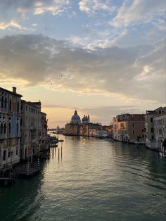 the sun is setting in venice, italy