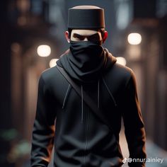 a man wearing a black outfit and a bandana walking down a street at night