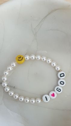 Crystal round pearls 5mm Acrylic Happy face 8mm yellow&Black Clear nylon cord.  Happy beads that will put a smile on your face :) Cheap White Smiley Face Bracelets, White Bracelets With Smiley Face For Gift, White Smiley Face Bracelet As Gift, Smiley Face Bracelet, I Love God, Christian Bracelets, Bracelet Pearl, Clay Bracelet, Bracelet Ideas