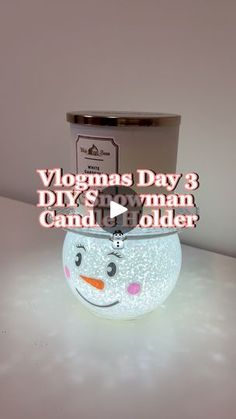 a candle holder with a snowman face on it and the words, vlogmas day 3 diy & gum man candy holder