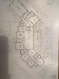 a blueprint shows the floor plan for an apartment complex, which is currently under construction