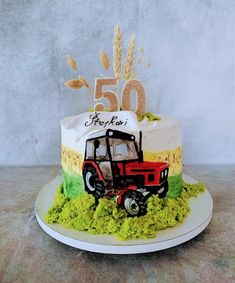 a 50th birthday cake with a tractor and wheat on the top is for someone's 50th