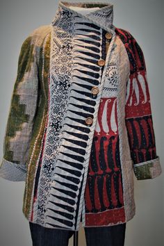 a coat made out of fabric on display