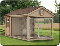 a dog house with a fence around it