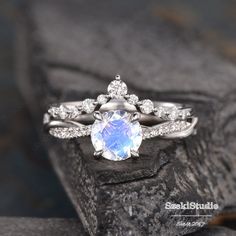 a white gold engagement ring set with an oval cut diamond