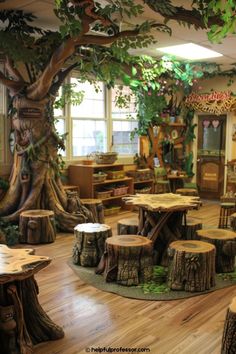 the children's playroom is decorated with tree stumps