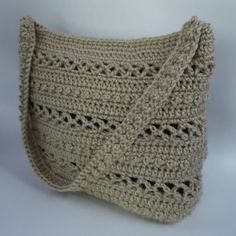 a crocheted purse is shown on a white background