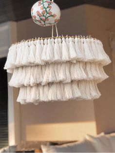 a white chandelier hanging from the ceiling