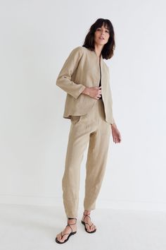 Introducing our First Light Linen Jacket - the epitome of timeless elegance and comfort. Crafted from the finest linen fabric, this jacket is a must-have addition to your wardrobe, offering a perfect balance between sophistication and laid-back charm. Relaxed fit Buttonless Large Lapels Long Sleeves Timeless Linen Outerwear With Pockets, Timeless Linen Fall Blazer, Elegant Linen Outerwear In Neutral Color, Timeless Linen Blazer For Fall, Elegant Neutral Linen Outerwear, Chic Linen Outerwear For Everyday, Chic Linen Everyday Outerwear, Neutral Linen Outerwear For Work, Spring Linen Blazer For Daywear