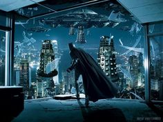 the dark knight rises in batman's new poster