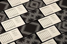 many business cards stacked on top of each other in black and white stripes, with the words viesse flotatis written across them