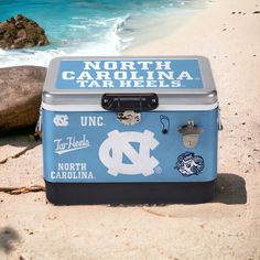 the north carolina tar heels ice chest is on the beach