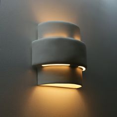 a wall light that is on the side of a wall