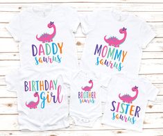 three shirts with the words, daddy and baby dinosaurs printed on them in different colors