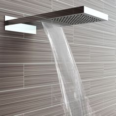 a shower head with water flowing from it