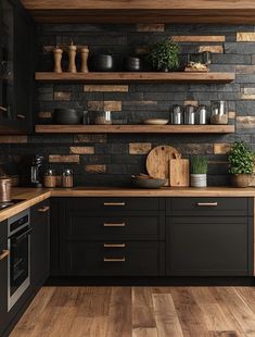 a kitchen with black cabinets and wooden shelves