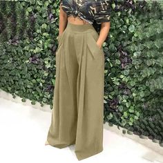 Brand Name: CelmiaPant Style: Wide Leg PantsMaterial: NylonMaterial: RayonFit Type: LOOSELength: Full LengthDecoration: PocketsOrigin: CN(Origin)Season: Spring/AutumnWaist Type: HIGHModel Number: Stylish Ladies Pants;Oversized Retro Baggy PantsPattern Type: SolidStyle: CasualFront Style: PleatedFabric Type: BroadclothClosure Type: Elastic WaistGender: WOMENMaterial: 80% rayon + 20% nylonColor: Khaki,Wine Red,BlackSize: S/M/L/XL/2XLSeason: Spring/Summer/Autumn/WinterOccasion: Casual/Holiday/Party