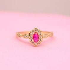 14K 18K Solid Gold Ruby Ring Product Features Weight: 1.90 Gr ⚖️ Material Colors: Yellow Gold, Rose Gold, and White Gold 🌈 Presentation: Shipped with a special box and bag 🎁 Returns: Right to return within 7 days 🔄 Material and Color: Product color does not fade or darken ✨ Handcraftsmanship and Uniqueness: Handcrafted and may vary by 5% (+-) 🛠️ Ruby Information Ruby is a precious gemstone known for its vibrant red color, symbolizing love, passion, and energy. It has been highly valued throu Elegant Ruby Wedding Ring With Halo, Elegant 14k Gold Ruby Ring With Halo Design, Dainty Oval Ruby Ring With Diamonds, Elegant Ruby Ring With Halo Design For Wedding, Oval Ruby Ring With Halo Design For Wedding, Elegant Wedding Ruby Ring With Halo Design, Dainty Oval Ring With Halo Setting, 14k Gold Oval Ruby Ring For Wedding, Oval Gold Ruby Ring For Wedding