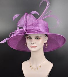 "IF YOU LIKE THE DESIGN, JUST WANT TO ADD SOME COLORS TO MATCH YOUR DRESS, PLEASE FEEL FREE TO CONTACT ME, I WILL HELP YOU. This 3 layers wide brim sinamay hat boasts a captivating ensemble, featuring 3 pcs  pheasant feather  and a few real feathers that add a touch of wild elegance. Accentuating its allure is a generously sized linen sinamay  bow, gracefully tying together the essence of sophistication and a hint of untamed charm. 100% 3 layers Sinamay, light and comfortable *Wide brim: Size: F Purple Wide Brim Hat For Races, Purple Wide Brim Hat For Church, Purple Short Brim Hat For Kentucky Derby, Purple Hat With Short Brim For Royal Ascot, Purple Short Brim Hat For Royal Ascot, Sinamay Hats, Pheasant Feathers, Tea Party Hats, Kentucky Derby Hat