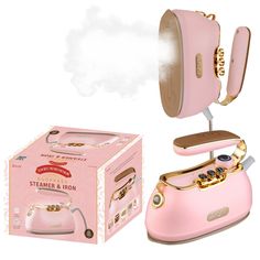 the steamer and iron is pink with gold accents