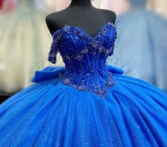 Blue Embellished Fitted Quinceanera Dress, Blue Embellished Quinceanera Dress For Party, Embellished Blue Quinceanera Dress For Party, Embellished Princess Style Quinceanera Dress, Royal Blue Ball Gown For Quinceanera During Prom Season, Blue Embellished Ball Gown Quinceanera Dress, Blue Embellished Gown For Quinceanera, Blue Quinceanera Dress With Fitted Bodice For Pageant, Embellished Tulle Quinceanera Dress