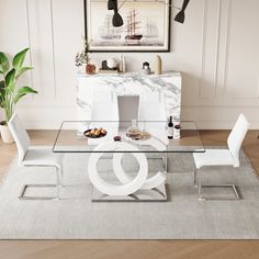 a glass dining table with white chairs and an amp sign on the wall above it