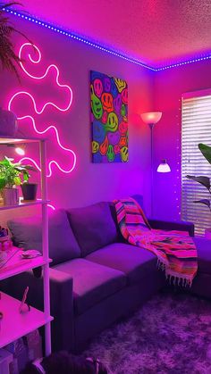 a living room filled with furniture and neon lights