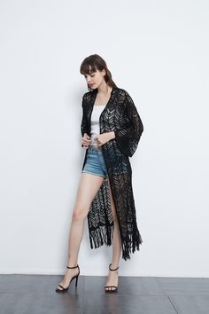 Product Description:A great cardigan for both dressy and casual outfits. Use as a finishing touch over high-waisted shorts and a crop top. Throw it over your swimsuit at the pool or beach. Pair with a pencil dress and wedges for a cute brunch outfit. Or go for a bohemian chic daytime look with a cami. distressed jeans. and booties!Care & Content:100% Poly Lightweight Casual Cover-up, Black V-neck Cardigan For Vacation, Black Long Cardigan For Beach, Long Black Summer Cardigan, Fitted Casual Cover-up For Day Out, Black Long Cardigan For Summer, Casual Cover-up For Day Out, Casual Open Front Cover-up For Day Out, Casual Fitted Day Out Cover-up