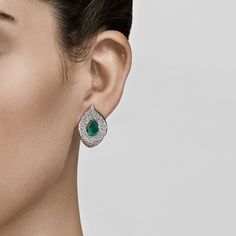 The French have been known to describe emeralds as a “jardin,” or “garden,” for their signature depth, glow, and an array of subtle markings within each crystal, with no two stones exactly alike, like a unique fingerprint from Mother Nature. The Jardin Earrings take this idea a step further with their leaf-like silhouette. Get lost in the winding maze of 186 pavé-set diamonds totaling 2.13 carats that surround two pear-shaped emeralds that weigh a combined 1.86 carats Details18K White Gold1.86 C Modern Formal Emerald Jewelry, Exquisite Green Jewelry With Pave Setting, Fine Jewelry Emerald Pear-shaped Earrings, Luxury Pear-shaped Emerald Earrings, Pear-shaped Emerald Earrings Fine Jewelry, Fine Jewelry Emerald Teardrop Earrings, Emerald Teardrop Earrings Fine Jewelry, Teardrop Emerald Jewelry With Brilliant Cut, Formal Emerald Drop Jewelry