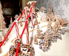 gingerbread christmas trees and cookies are on display